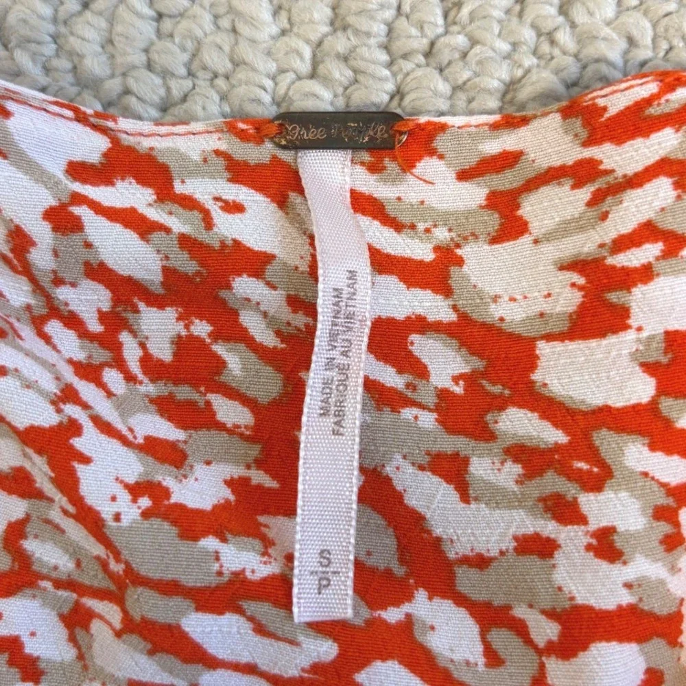 Free People French Quarter mini wrap dress, Small Orange White Animal Print boho
